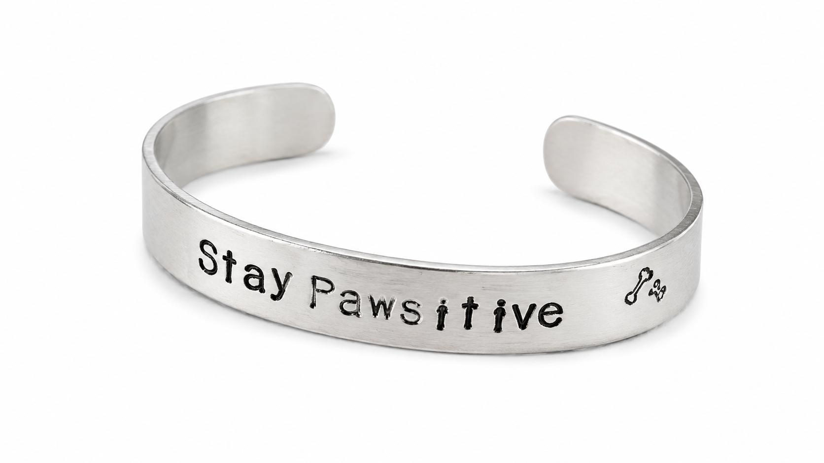 "Stay Pawsitive" hand-stamped Cuff